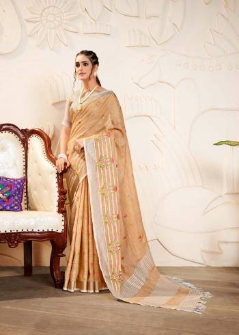 Attrective Looking This Saree Are Fine Saree Paired With Blouse.This Saree And Blouse Are Linen Based Fabric With Wevon Designer Pallu With Embroidery Work. Buy This Pretty Saree Now.