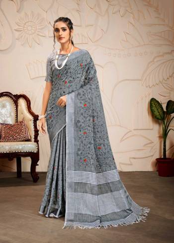 Attrective Looking This Saree Are Fine Saree Paired With Blouse.This Saree And Blouse Are Linen Based Fabric With Wevon Designer Pallu With Embroidery Work. Buy This Pretty Saree Now.