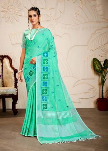 Attrective Looking This Saree Are Fine Saree Paired With Blouse.This Saree And Blouse Are Linen Based Fabric With Wevon Designer Pallu With Embroidery Work. Buy This Pretty Saree Now.