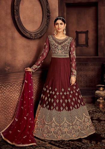 Stylist This Partywear Designer Long Length Suit In Lovely Color.Its Pretty Heavy Designer Jari Embroidery Work Top Is Butterfly Net Based Paired With Santoon Bottom And Butterfly Net Fabricated Dupatta Which Gives An Attractive To The Suit.