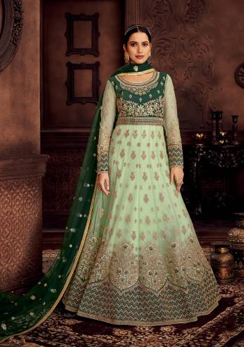 Stylist This Partywear Designer Long Length Suit In Lovely Color.Its Pretty Heavy Designer Jari Embroidery Work Top Is Butterfly Net Based Paired With Santoon Bottom And Butterfly Net Fabricated Dupatta Which Gives An Attractive To The Suit.