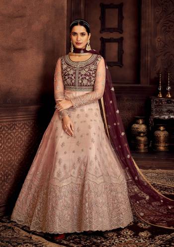 Stylist This Partywear Designer Long Length Suit In Lovely Color.Its Pretty Heavy Designer Jari Embroidery Work Top Is Butterfly Net Based Paired With Santoon Bottom And Butterfly Net Fabricated Dupatta Which Gives An Attractive To The Suit.