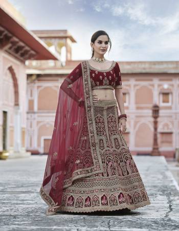 Garb This Bridal Heavy Designer Lehenga Choli In Fine Color Fabricated On Velvet Beautified Fabric Lahenga Choli With Heavy Designer Embroidery With Hand Work.Buy Now. 