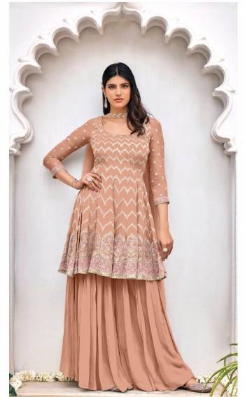 Garb This Designer Sharara Suit In Fine Color.Its Pretty Heavy Designer Embroidery Work Top Is Viscose Georgette Based Paired With Viscose Georgette Bottom And Soft Net Fabricated Dupatta Which Gives An Attractive To The Suit.