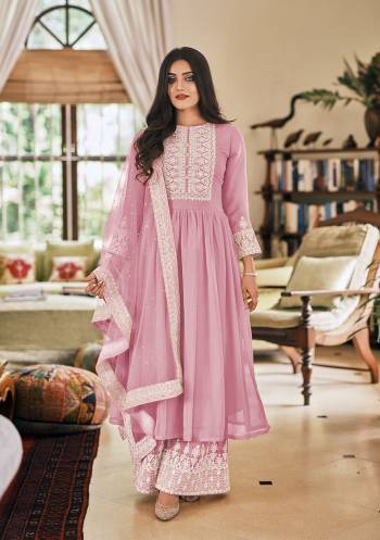 Looking This Designer Plazzo Suit In Fine Color.Its Pretty Heavy Designer Thread Embroidery Work Top Is Faux Georgette Based Paired With Georgette Bottom And Soft Net Fabricated Dupatta Which Gives An Attractive To The Suit.