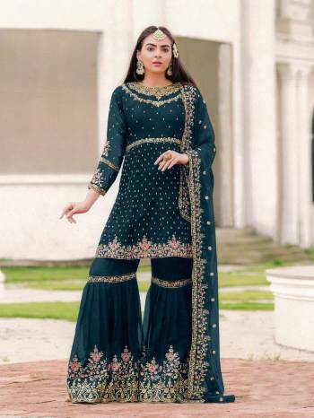 AttrectiveThis Designer Sharara Suit In Lovely Blooming Color.Its Pretty Heavy Designer Thread Embroidery Work Top Is Georgette Based Paired With Georgette Bottom And Georgette Fabricated Dupatta Which Gives An Attractive To The Suit.