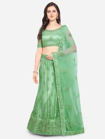 Attrective This Partywear Heavy Designer Lehenga Choli And Dupatta In Fine Color Fabricated On Net Beautified With Heavy Attractive Jari Embroidery Work.Buy Now. 