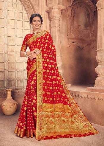 Looking This Lovely Colored Traditional Designer Saree. This Saree?And Blouse Are Fabricated On Chiffon Beautified With Designer Weaving Jari Work. Buy This Pretty Saree Now.