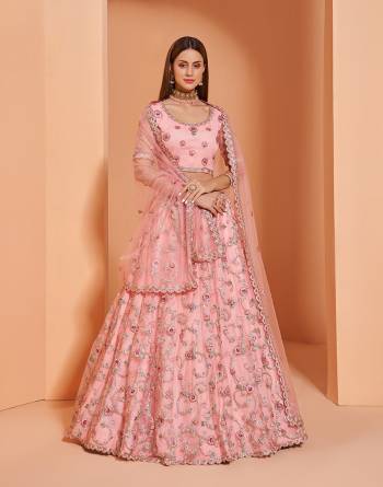 Garb This Designer Wedding Lehenga Choli With Belt In Fine Color Fabricated On Net Beautified Fabric Lahenga Choli With Designer Heavy Thread, Sequance,Coading,Badla Embroidery With Zarkan Work.Buy Now. 