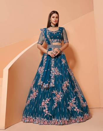 Garb This Designer Wedding Lehenga Choli With Belt In Fine Color Fabricated On Net Beautified Fabric Lahenga Choli With Designer Heavy Thread, Sequance,Coading,Badla Embroidery With Zarkan Work.Buy Now. 