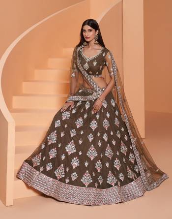 Garb This Designer Wedding Lehenga Choli With Belt In Fine Color Fabricated On Net Beautified Fabric Lahenga Choli With Designer Heavy Thread, Sequance,Coading,Badla Embroidery With Zarkan,Mirror Work.Buy Now. 