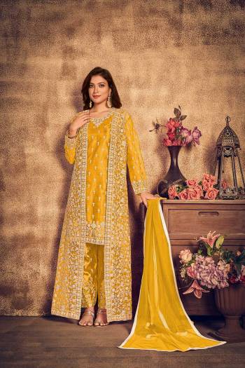 Stylist This Partywear Designer Long Length Suit In Lovely Color.Its Pretty Heavy Designer Thread,Sequance Embroidery Work Top Is Net Based Paired With Satin Bottom And Net Fabricated Dupatta Which Gives An Attractive To The Suit.