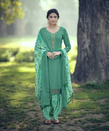 This Designer Patiyala Suit In Fine Color.Its Pretty Heavy Designer Embroidery Work Top Is Royal Crepe Based Paired With Royal Crepe Bottom And Faux Georgette Fabricated Digital Printed Dupatta Which Gives An Attractive To The Suit.