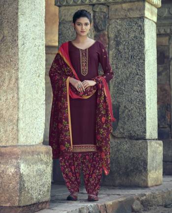 This Designer Patiyala Suit In Fine Color.Its Pretty Heavy Designer Embroidery Work Top Is Royal Crepe Based Paired With Royal Crepe Bottom And Faux Georgette Fabricated Digital Printed Dupatta Which Gives An Attractive To The Suit.