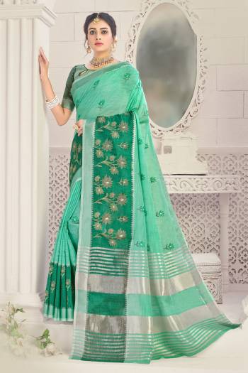 Garb This Tassle Saree Paired With Blouse.This Saree And Blouse Are Linen Based Fabric With Wevon Designer With Embroidery Work. Buy This Pretty Saree Now.