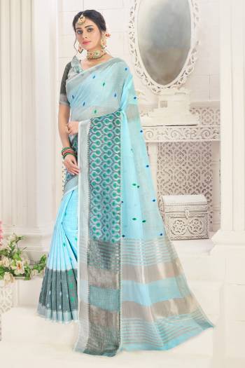 Garb This Tassle Saree Paired With Blouse.This Saree And Blouse Are Linen Based Fabric With Wevon Designer With Embroidery Work. Buy This Pretty Saree Now.