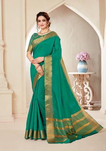 Your Personality In This Lovely Colored Designer Saree. This Saree?And Blouse Are Fabricated On Spun Cottont Silk Beautified With Wevon Designer. Buy This Pretty Saree Now.