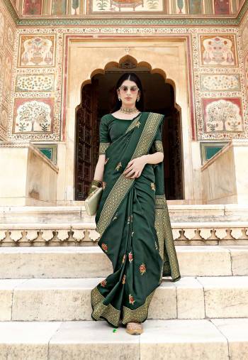 Garb This Partywear Stylist Designer Fine Colour Saree Paired With Blouse.This Saree Are Banarasi Satin Silk And Blouse Are Banarasi Satin Silk Fabric With Heavy Designer Wevon Work. Buy This Pretty Saree Now.