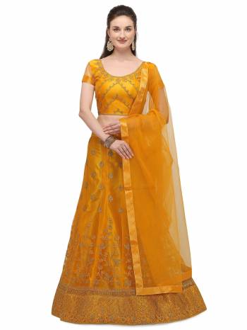 Attrective This Partywear Heavy Designer Lehenga Choli And Dupatta In Fine Color Fabricated On Net Beautified With Heavy Attractive Jari Embroidery Work.Buy Now. 