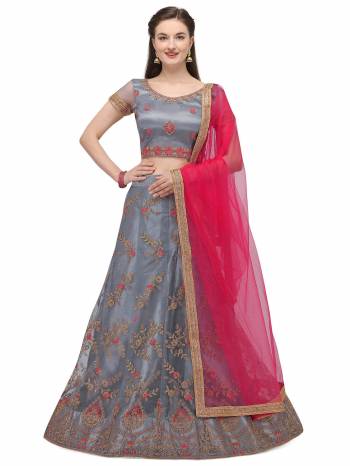 Attrective This Partywear Heavy Designer Lehenga Choli And Dupatta In Fine Color Fabricated On Net Beautified With Heavy Attractive Jari Embroidery Work.Buy Now. 