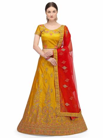 Garb This Partywear Heavy Designer Lehenga Choli And Dupatta In Fine Color Fabricated On Satin Silk Beautified With Heavy Attractive Embroidery Work.Buy Now. 