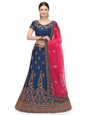 Garb This Partywear Heavy Designer Lehenga Choli And Dupatta In Fine Color Fabricated On Satin Silk Beautified With Heavy Attractive Embroidery Work.Buy Now. 