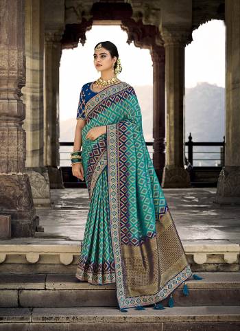 Garb This Partywear Stylist Designer Fine Colour Saree Paired With Contrasted Blouse.This Saree Are Dola Silk And Blouse Are Raw Silk Fabric With Heavy Designer Weaving With Embroidery Work Border Blouse. Buy This Pretty Saree Now.