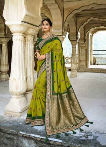 Garb This Partywear Stylist Designer Fine Colour Saree Paired With Contrasted Blouse.This Saree Are Dola Silk And Blouse Are Raw Silk Fabric With Heavy Designer Weaving With Embroidery Work Border Blouse. Buy This Pretty Saree Now.