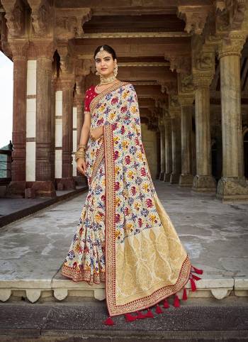 Garb This Partywear Stylist Designer Fine Colour Saree Paired With Contrasted Blouse.This Saree Are Dola Silk And Blouse Are Raw Silk Fabric With Heavy Designer Weaving With Embroidery Work Border Blouse. Buy This Pretty Saree Now.