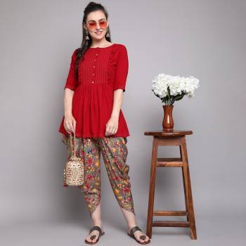 Garb This Good Looking Readymade Long Kurti With Dhoti In Fine Color. Kurti And Dhoti Are Rayon Fabricated Beautified With Designer Hand Designer With Printed Dhoti. It Is Light In Weight And Easy To Carry All Day Long. 