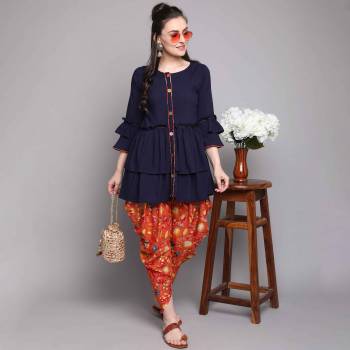 Garb This Good Looking Readymade Long Kurti With Dhoti In Fine Color. Kurti And Dhoti Are Rayon Fabricated Beautified With Designer Hand Designer With Printed Dhoti. It Is Light In Weight And Easy To Carry All Day Long. 