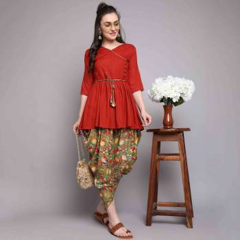 Garb This Good Looking Readymade Long Kurti With Dhoti In Fine Color. Kurti And Dhoti Are Rayon Fabricated Beautified With Designer Hand Designer With Printed Dhoti. It Is Light In Weight And Easy To Carry All Day Long. 