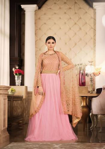 Looking This Designer Suits In Lovely Color.?Its Pretty Designer Thread,Jari Embroidery Work Top Is Net Based Paired Bottom Santoon With Net Fabricated Dupatta Which Gives An Attractive To The Dress.