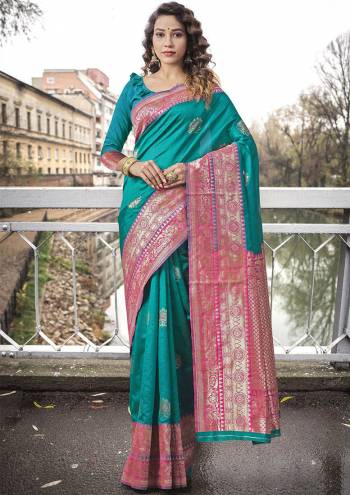 Garb This Tassle Saree Paired With Blouse.This Saree And Blouse Are Lichi Silk Based Fabric With Wevon Self Designer Work. Buy This Pretty Saree Now.