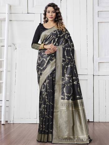 Garb This Tassle Saree Paired With Blouse.This Saree And Blouse Are Lichi Silk Based Fabric With Wevon Self Designer Work. Buy This Pretty Saree Now.