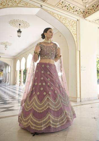 Looking This Bridal Heavy Designer Lehenga Choli In Fine Light Color Fabricated On Soft Net Beautified Fabric With Heavy Designer Sequance,Dori Embroidery Work.Buy Now. 