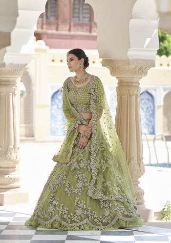 Looking This Bridal Heavy Designer Lehenga Choli In Fine Light Color Fabricated On Soft Net Beautified Fabric With Heavy Designer Sequance,Dori Embroidery Work.Buy Now. 