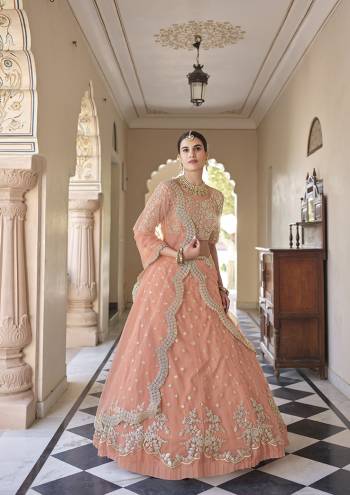 Looking This Bridal Heavy Designer Lehenga Choli In Fine Light Color Fabricated On Soft Net Beautified Fabric With Heavy Designer Sequance,Dori Embroidery Work.Buy Now. 