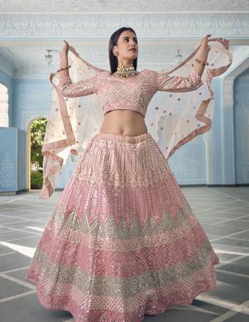 Garb This Wedding Partywear Heavy Designer Lehenga Choli In Fine Light Color Fabricated On Organza Beautified Fabric With Heavy Designer Embroidery Work.Buy Now. 