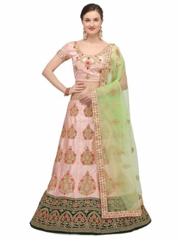 Garb This Partywear Heavy Designer Lehenga Choli And Dupatta In Fine Color Fabricated On Satin Silk Beautified With Heavy Attractive Embroidery Work.Buy Now. 