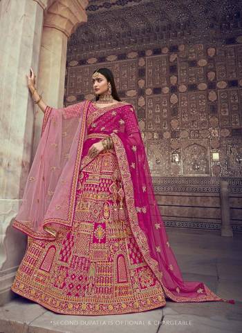 Garb This Heavy Designer Wedding Lehenga Choli In Bridel Color Fabricated On Raw Silk Beautified Fabric Choli And Lahenga Are Silk With Dupatta Are Net Fabric With Designer Heavy Thread, Sequance,Coading,Jari Embroidery With Hand Work.Buy Now. 