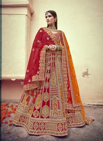 Garb This Heavy Designer Wedding Lehenga Choli In Bridel Color Fabricated On Raw Silk Beautified Fabric Choli And Lahenga Are Silk With Dupatta Are Net Fabric With Designer Heavy Thread, Sequance,Coading,Jari Embroidery With Hand Work.Buy Now. 