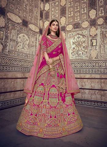 Garb This Heavy Designer Wedding Lehenga Choli In Bridel Color Fabricated On Raw Silk Beautified Fabric Choli And Lahenga Are Silk With Dupatta Are Net Fabric With Designer Heavy Thread, Sequance,Coading,Jari Embroidery With Hand Work.Buy Now. 