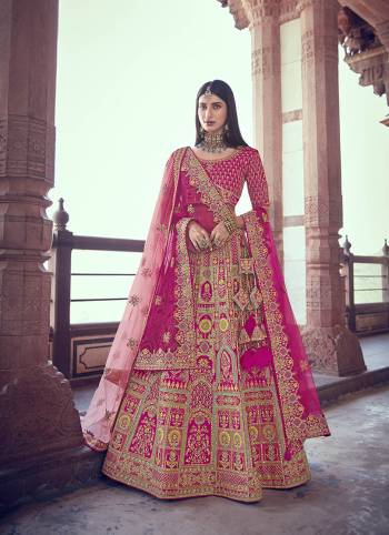 Garb This Heavy Designer Wedding Lehenga Choli In Bridel Color Fabricated On Raw Silk Beautified Fabric Choli And Lahenga Are Silk With Dupatta Are Net Fabric With Designer Heavy Thread, Sequance,Coading,Jari Embroidery With Hand Work.Buy Now. 