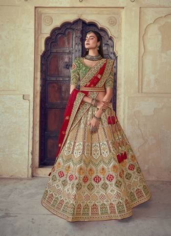 Garb This Heavy Designer Wedding Lehenga Choli In Bridel Color Fabricated On Raw Silk Beautified Fabric Choli And Lahenga Are Silk With Dupatta Are Net Fabric With Designer Heavy Thread, Sequance,Coading,Jari Embroidery With Hand Work.Buy Now. 