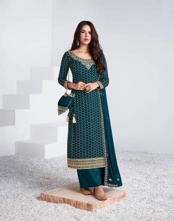 Attrective This Partywear Collection In Long Length Fine Color.Its Pretty Heavy Designer Embroidery Work Top Is Georgette Based Paired With Santoon Bottom And Georgette Fabricated Dupatta Which Gives An Attractive To The Suit.Buy Now.