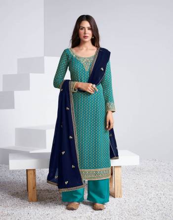 Attrective This Partywear Collection In Long Length Fine Color.Its Pretty Heavy Designer Embroidery Work Top Is Georgette Based Paired With Santoon Bottom And Georgette Fabricated Dupatta Which Gives An Attractive To The Suit.Buy Now.