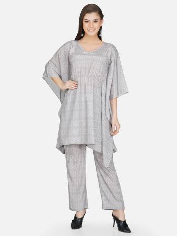 Looking Attrective This Readymade Long Kaftan Kurti With Bottom In Fine Color. Kaftan Kurti And Bottom Are Polyester Fabricated Beautified With Designer Self Prited. It Is Light In Weight And Easy To Carry All Day Long. 