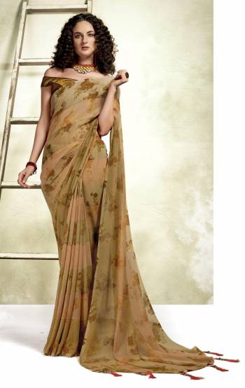 Looking This Pretty Elegant Looking Designer Saree In Fine Color Paired With Blouse. This Saree Are Georgette And Blouse Are Banglori Silk Based Beautified With Floral Printed With Foil Embellished. Buy Now.