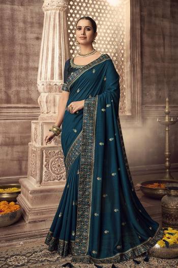 Stylist This Partywear Designer Fine Colour Saree Paired With Blouse.This Saree Are Vichitra Silk And Blouse Are Two Tone Phantom Silk Fabric With Heavy Jari,Resham Embroidery Embroidery,Stone Work Blouse. Buy This Pretty Saree Now.